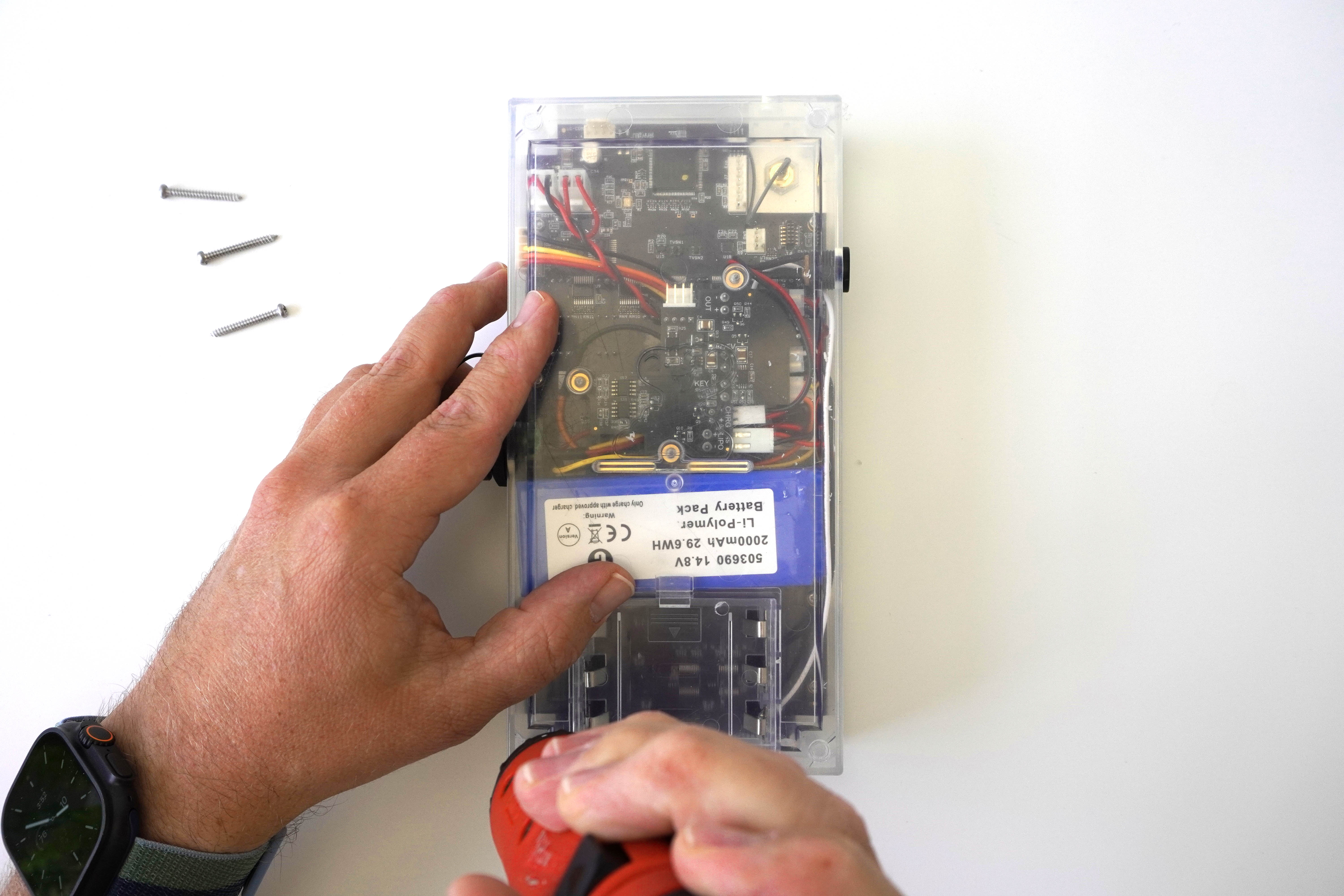 Remove screws from enclosure